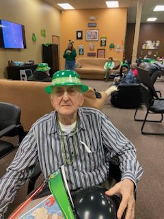 Senior Man Wearing Green Cap